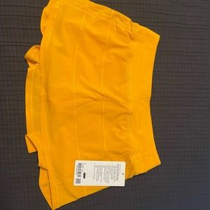 NWT Lululemon Pace Rival Skirt. Gold/ yellow, size 6